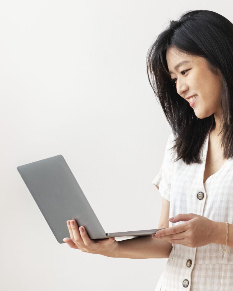 Happy Asian woman working from home